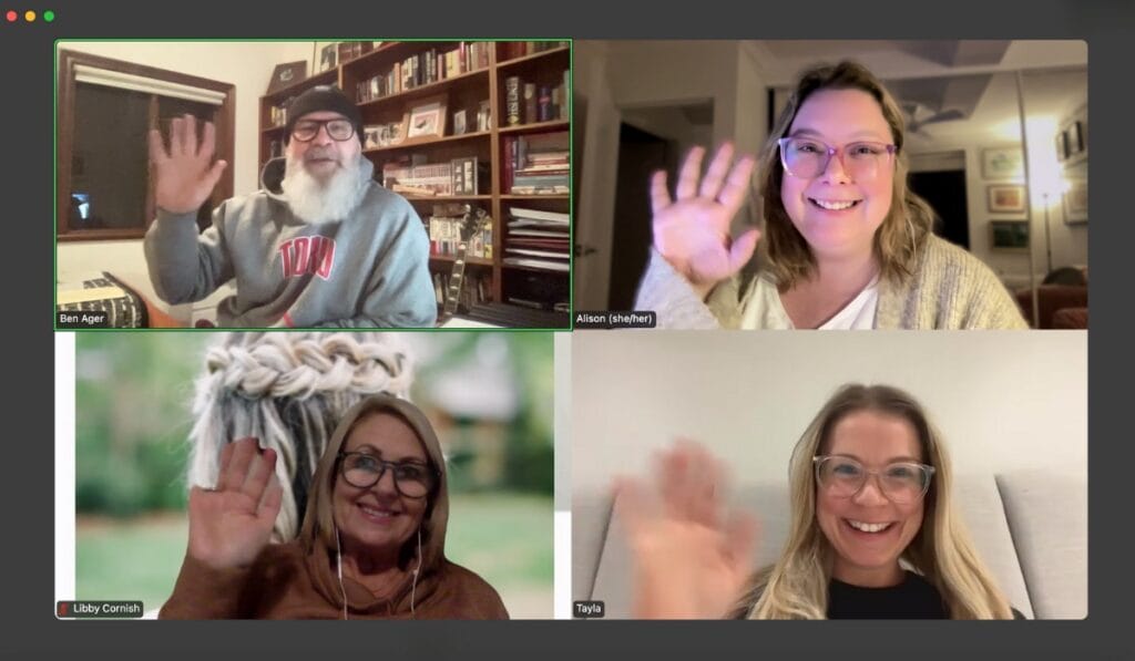 Screen grab of four celebrants on a Zoom call waving to the camera