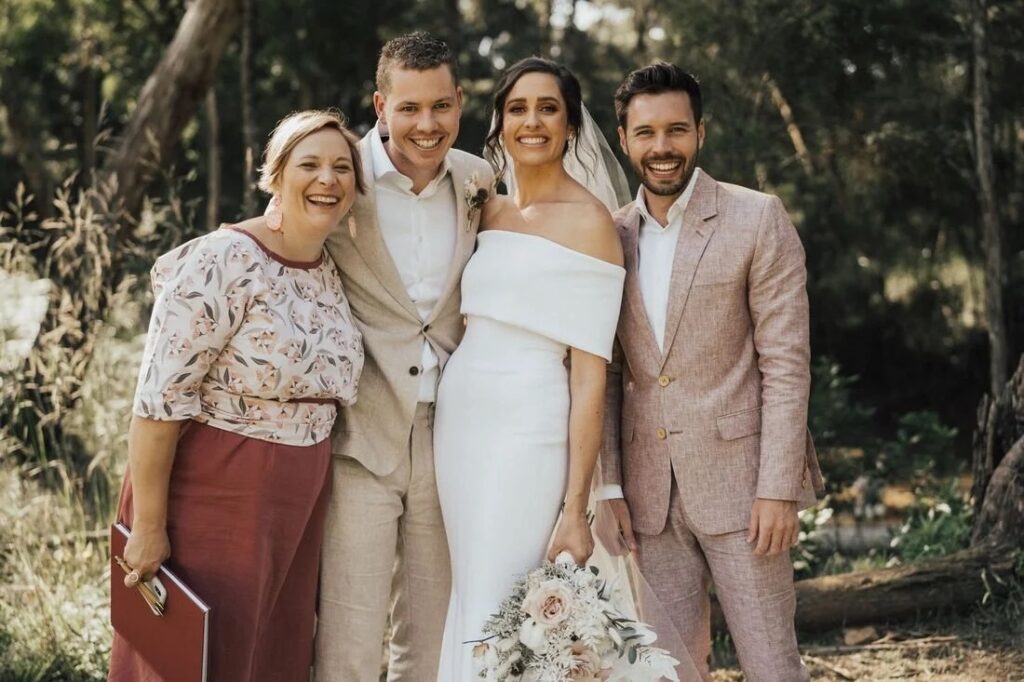 Melbourne celebrant Dee Wild with a bride and groom, Casey and Riley, and their friend who delivered the co-pilot wedding ceremony